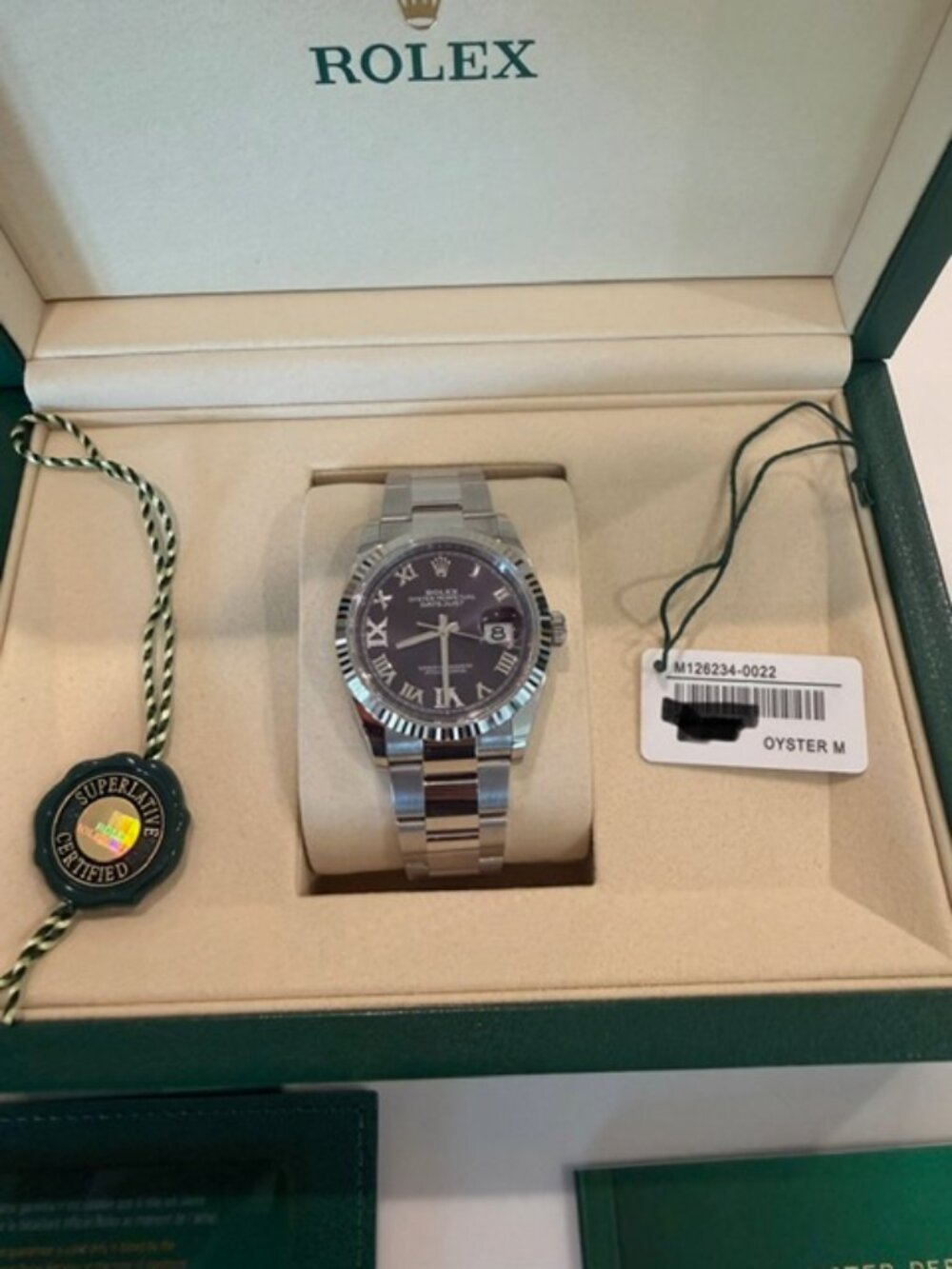 Rolex 126234 Purple Aubergine - Dated May 2026 - Brand New, unsized and unworn.